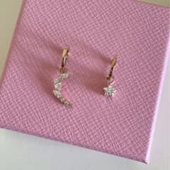 スワロフスキー MOONSUN フープピアス 5486354 - メルカリ