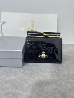 Vivienne Westwood 三つ折り財布　黒 金マークのサムネイル