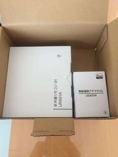 【新品】au with HOME 無線通信アダプタと赤外線リモコンのサムネイル
