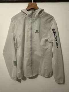 Salomon フード付きウィンドブレーカー ホワイト - メルカリ
