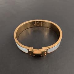 HERMÈS エルメス クリックH バングル ホワイト×ゴールド PMサイズのサムネイル