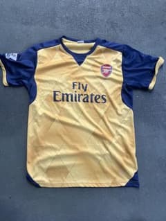 アーセナル サッカーシャツ ゴールド ネイビー 41のサムネイル