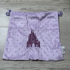 Disney drawstring bag, purple with polka dots and castle embroidery.