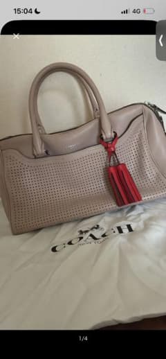 COACH パンチングレザー トートバッグのサムネイル