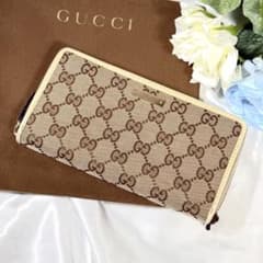 GUCCIグッチ ラウンドファスナー GGキャンバス ロゴプレート