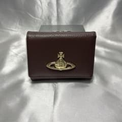 新品 Vivienne Westwood 茶 コーヒー色 大きなオーブ 三つ折り - メルカリ
