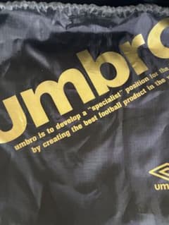 Umbro drawstring bag, black, for carrying soccer cleats.
