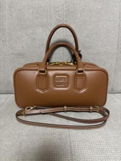 miumiu アルカディ ラージ コニャック - メルカリ