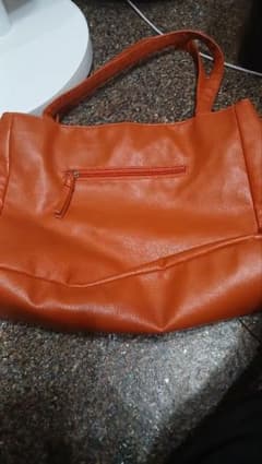 オレンジ ショルダーバッグのサムネイル