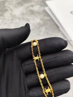 【美品】CELINE セリーヌ トリオンフパール ブレスレット ゴールド中古 美品】CELINE セリーヌ トリオンフパール ブレスレット ゴールド中古