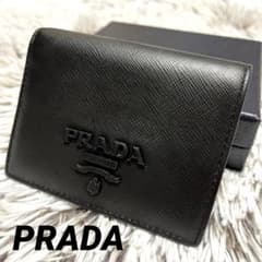 【美品✨】プラダ 折り財布 サフィアーノレザー ブランドロゴ 黒色のサムネイル
