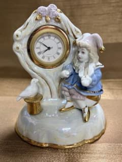 Ceramic mantel clock with clown and dove, antique.