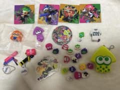 Splatoon merchandise bundle: stickers, erasers, keychains, gacha items.
