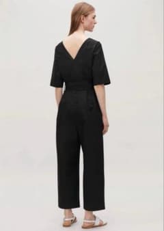 Brand new, unused COS black all-in-one