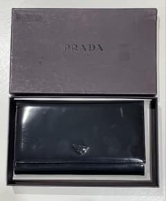 PRADA プラダ エナメル 長財布 ブラック TO.2713 - メルカリ