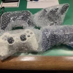 プレステーション3コントローラーと充電スタンドのサムネイル
