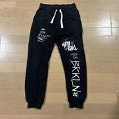 ブラック グラフィック スウェットパンツのサムネイル
