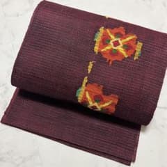 ゲリラセール【美品】【夏帯】【名古屋帯】小豆色 花柄 透け感あり【正絹】のサムネイル