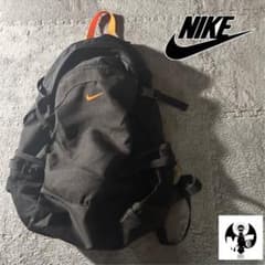Nike リュックサック 黒/オレンジ - メルカリ
