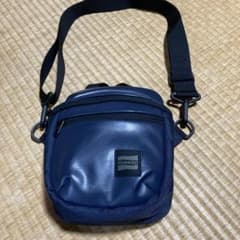 新品】NOMADIC ネイビー ショルダーバッグ - メルカリ