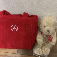 メルセデスベンツの鞄と熊のぬいぐるみのサムネイル