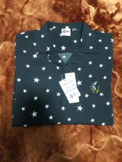 GU　ジョジョコラボ　星柄 黒 ポロシャツのサムネイル