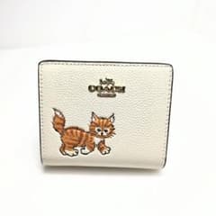⭐️新品・未使用⭐️コーチ　猫柄プリント　二つ折り財布 ⭐️新品・未使用⭐️コーチ 猫柄プリント 二つ折り財布 - メルカリ