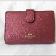 新品未使用！COACH コーチ 二つ折り財布のサムネイル