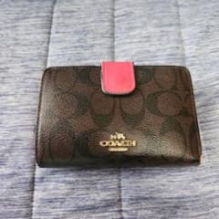 COACH シグネチャー 二つ折り財布 ブラウン×ピンク - メルカリ