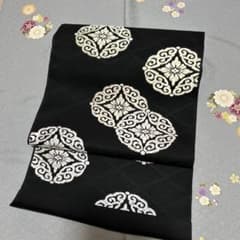 西陣高級唐織九寸帯 未仕立品　（株）橋本テル 黒地七宝華文絹100% 芯仕立込 西陣高級唐織九寸帯 未仕立品 （株）橋本テル 黒地七宝華文絹100