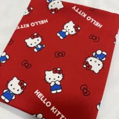 Holiday Sale! Authentic, reliable, and popular Hello Kitty cotton fabric in red.