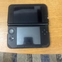 任天堂 New Nintendo 3DS LL 本体 ブラックシールで汚れてますのサムネイル