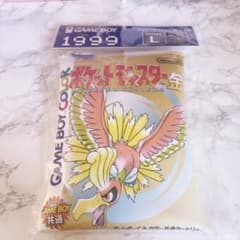 Lサイズ パッケージTシャツ in ポーチ ポケットモンスター 金　ホウオウ