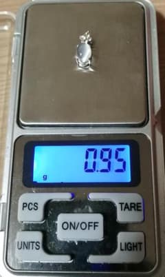 最終価格】k14WG 約0.95g ペンダントトップ SW - メルカリ