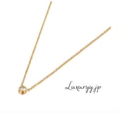 Highly popular, frequently worn surgical stainless steel necklace with a single top-quality cubic zirconia stone.