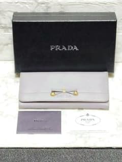 美品 PRADA プラダ 長財布 レザー ラベンダー リボン - メルカリ