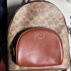 COACH ブラウンレザーリュック - メルカリ