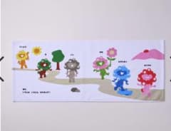 新品未使用　ミャクミャク　フェイスタオル《ミャクミャク誕生ものがたり》M