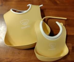 BabyBjörn お食事エプロン 大・小セット　パウダーイエローのサムネイル