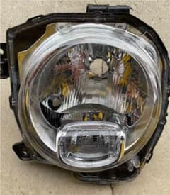 スズキ　ラパン　HE33S 純正ヘッドライト右側　ジャンク品のサムネイル