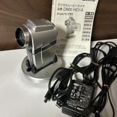 SANYO DMX-HD1A Digital Movie Camera: Includes camera body, cable, charger, and instruction manual.