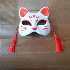 猫の顔のマスク 赤いタッセル付きのサムネイル