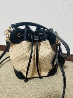 巾着型 ショルダーバッグ 総柄 ブラック ベージュのサムネイル