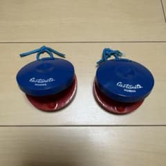 Wooden castanets, blue and red, percussion instrument