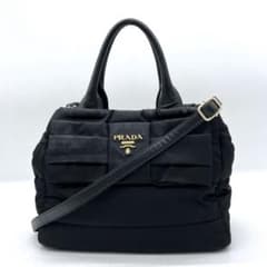 【PRADA】2wayバッグ　テスートボンバー　リボン　ロゴ金具　黒色. PRADA】2wayバッグ テスートボンバー リボン ロゴ金具 黒色 - メルカリ