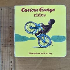 Curious George rides 英語絵本のサムネイル