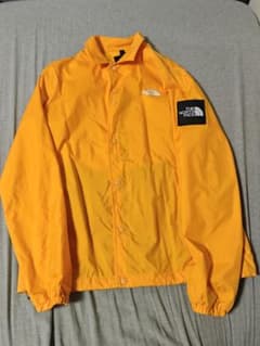 THE NORTH FACE コーチジャケット　イエローのサムネイル