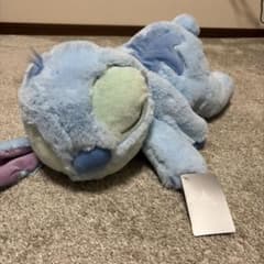 【新品タグ付き】ディズニーストアスティッチ　おねむりぬいぐるみ　約50センチのサムネイル
