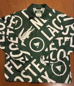 限定コラボ】ラコステ ネットフリックス 総柄コーチジャケット L 