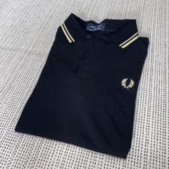 美品】FRED PERRY 黒 金 ポロシャツ M12 英国製 L - メルカリ